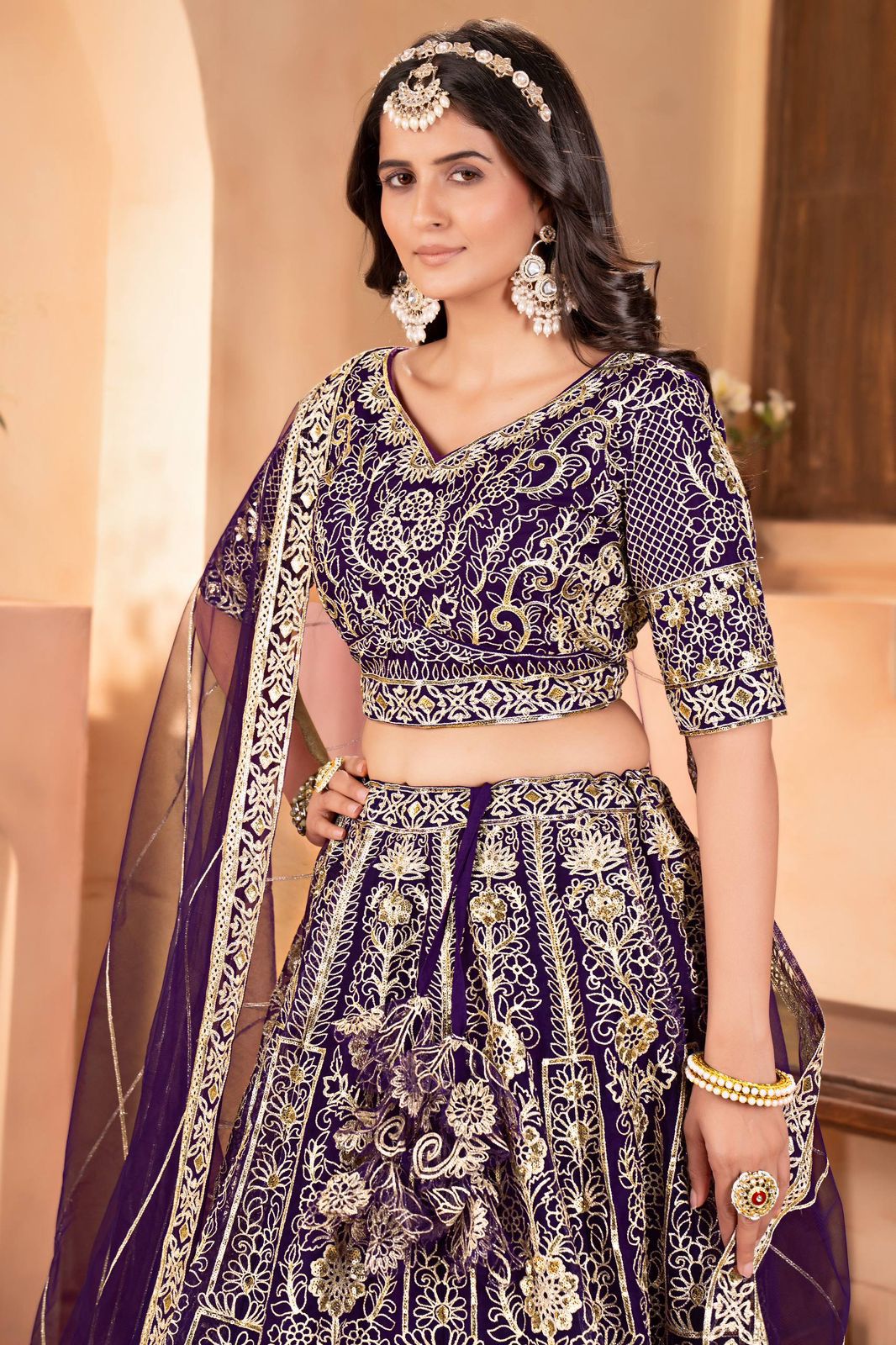 Regal Radiance Purple Net Embroidered Lehenga Choli Set